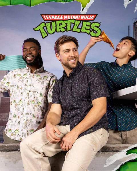 three-people-sitting-together-with-teenage-mutant-ninja-turtles-logo-above-them