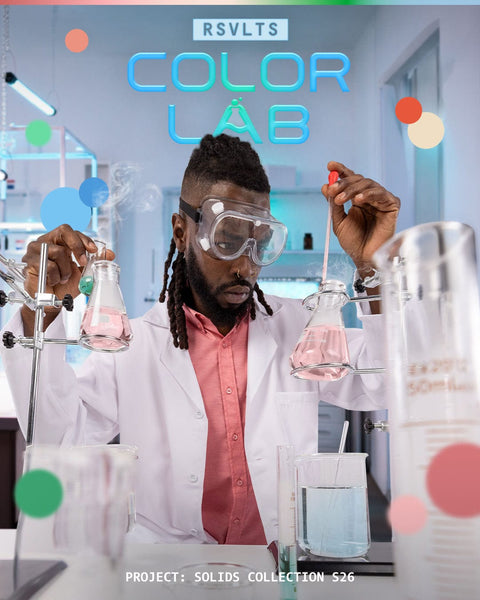 one-model-in-a-lab-theme-background-wearing-rsvlts-solid-color-kunuflxe-shirts-with-color-lab-branding