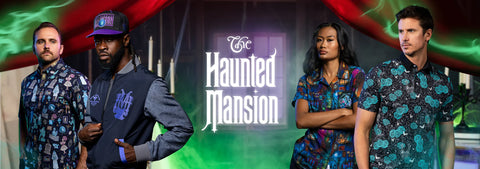 four-models-wearing-disneys-haunted-mansion-matching-patterned-shirts-polo-and-a-cap-stand-in-front-of-a-dark-background-with-red-and-green-draped-fabric-and-the-text-the-haunted-mansion-in-the-center