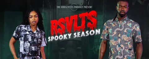 two-people-wearing-patterned-shirts-with-rsvlts-spooky-season-text-and-logo-in-the-background